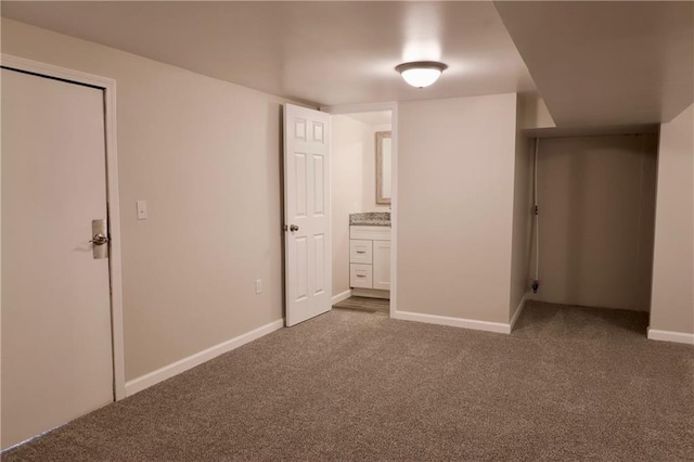 unfurnished bedroom with carpet floors