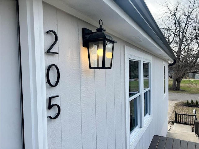 exterior details featuring ceiling fan