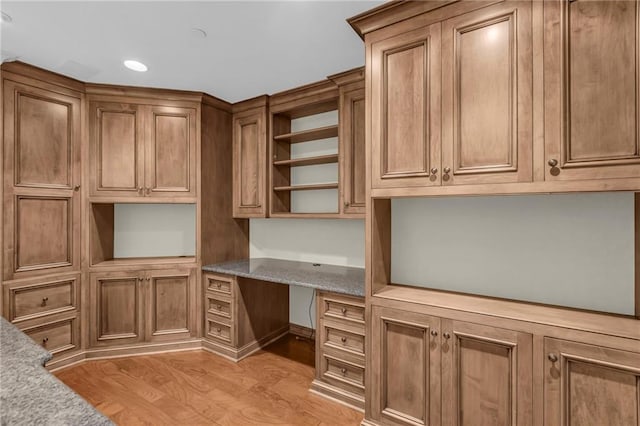 433 Ward Pkwy Unit 3S, Kansas City, MO 64112 - unfurnished office featuring built in desk, light wood finished floors, and recessed lighting