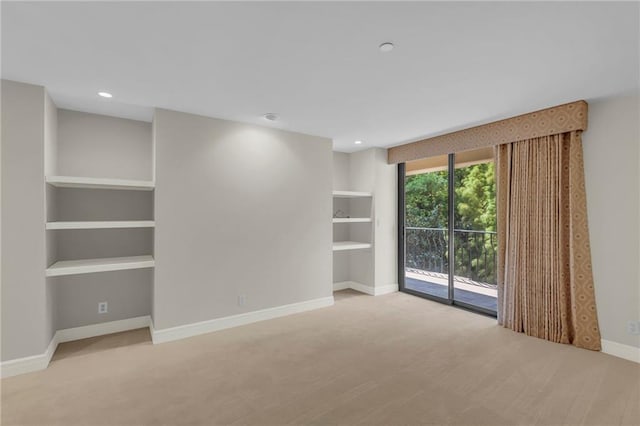 433 Ward Pkwy Unit 3S, Kansas City, MO 64112 - carpeted spare room with baseboards and recessed lighting