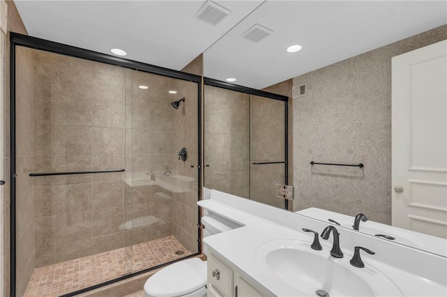 433 Ward Pkwy Unit 3S, Kansas City, MO 64112 - full bathroom featuring vanity, a shower stall, and recessed lighting