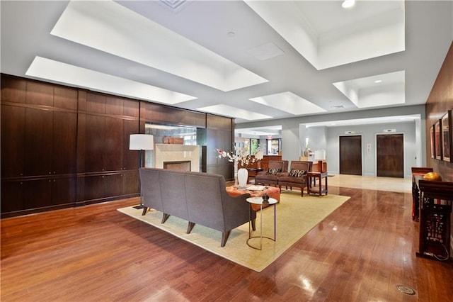 433 Ward Pkwy Unit 3S, Kansas City, MO 64112 - living room with wood finished floors, a fireplace, and elevator