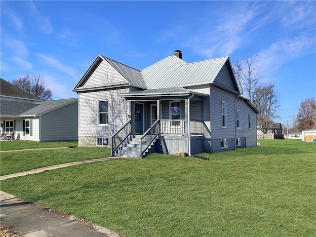 view of front of property with a front lawn and a porch