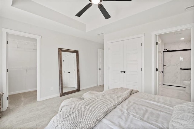 19704 W 195th Pl, Spring Hill, KS 66083 - carpeted bedroom with a walk in closet, ensuite bath, a closet, and ceiling fan