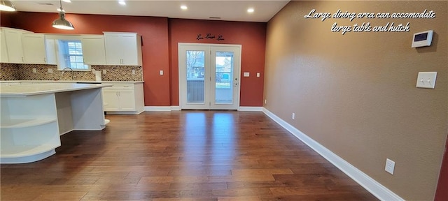 doorway featuring dark hardwood / wood-style flooring