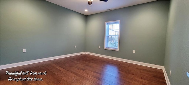 empty room featuring hardwood / wood-style flooring and ceiling fan