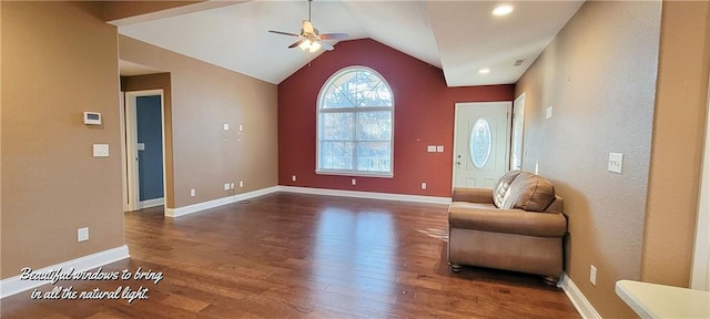 interior space with vaulted ceiling, ceiling fan, and dark hardwood / wood-style floors