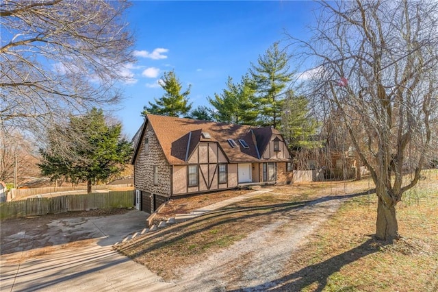 tudor house with a garage