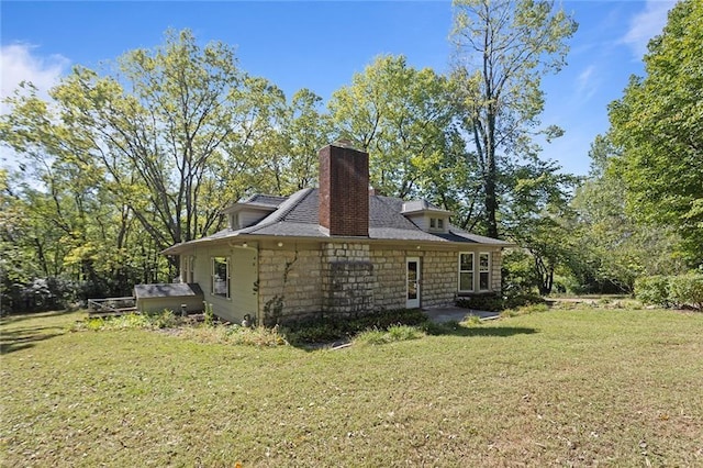 view of property exterior featuring a yard