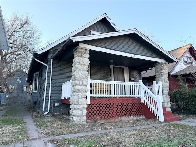 view of front of home featuring covered porch