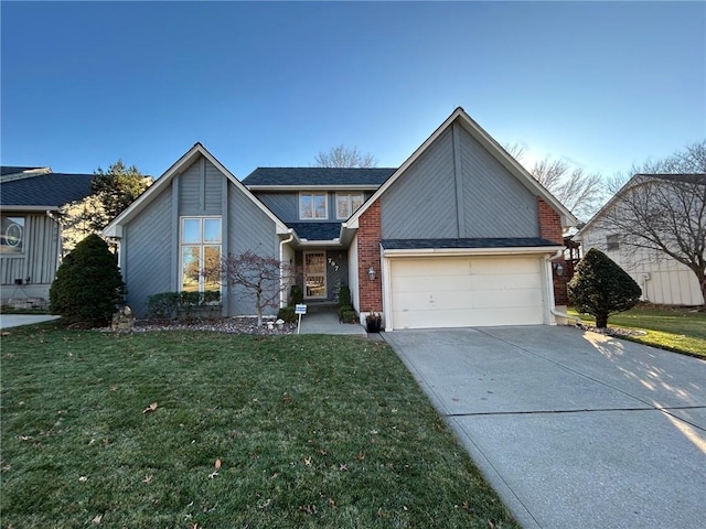 view of front property with a garage and a front lawn