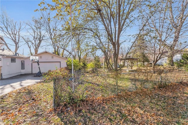 view of yard with a garage