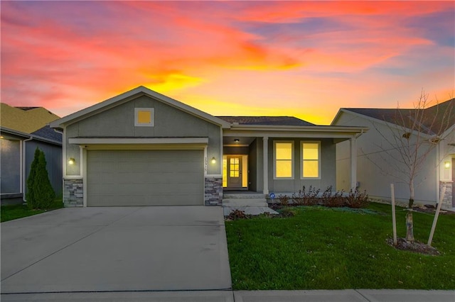 20915 W 190th Ter, Spring Hill, KS 66083 - view of front facade with a garage, concrete driveway, a front yard, stucco siding, and stone siding