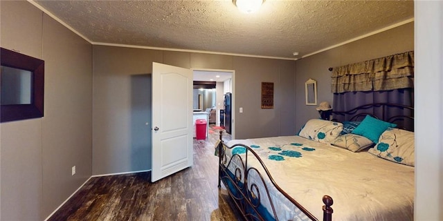 bedroom featuring a textured ceiling, dark hardwood / wood-style floors, and ornamental molding