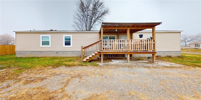 rear view of house with a deck