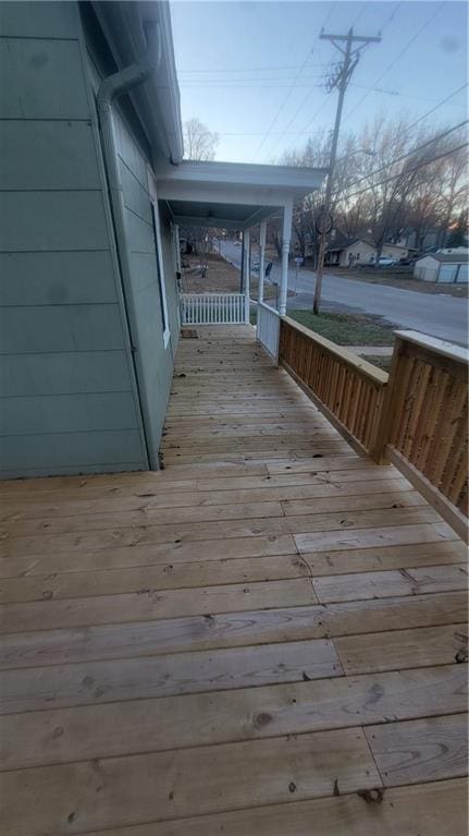 wooden terrace featuring a porch