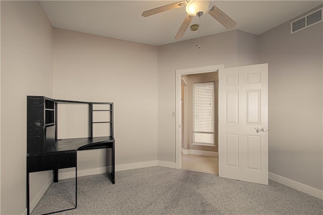 miscellaneous room with light carpet and ceiling fan