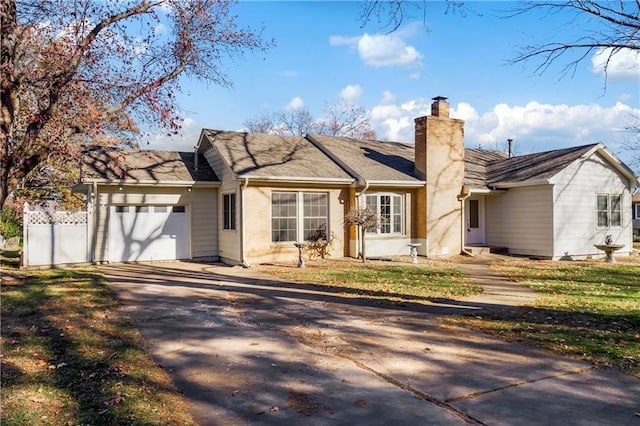 single story home featuring a garage