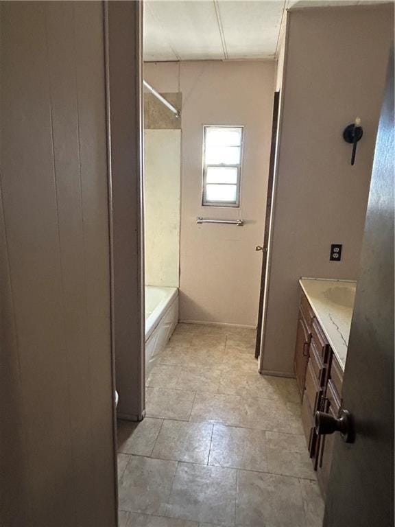 bathroom with vanity and  shower combination