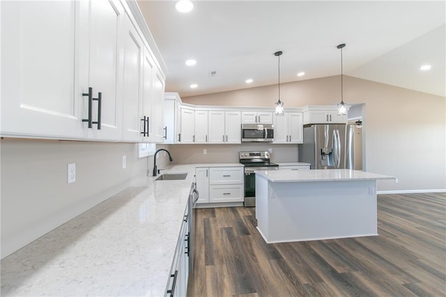 815 SW 520th Rd, Holden, MO 64040 - kitchen featuring stainless steel appliances, vaulted ceiling, white cabinets, a kitchen island, and dark wood-style flooring