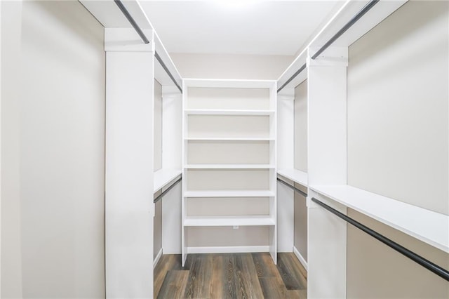 815 SW 520th Rd, Holden, MO 64040 - walk in closet featuring dark wood-type flooring