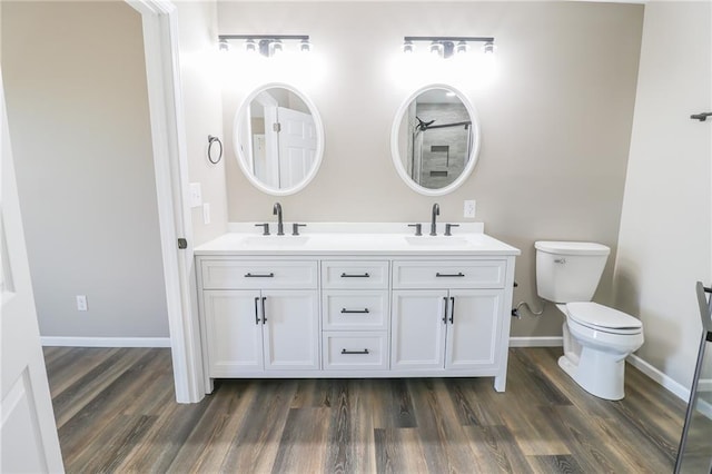 815 SW 520th Rd, Holden, MO 64040 - full bathroom with wood finished floors, double vanity, and a shower