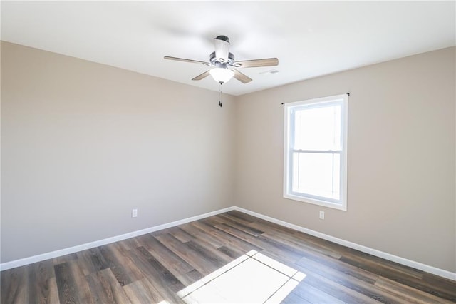 815 SW 520th Rd, Holden, MO 64040 - unfurnished room with wood finished floors and ceiling fan