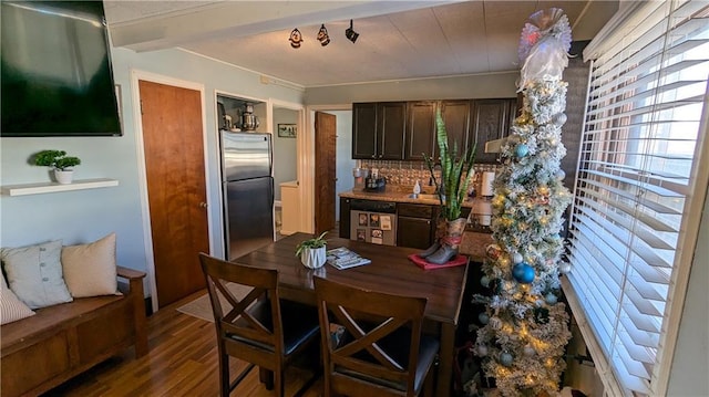 dining room with hardwood / wood-style flooring