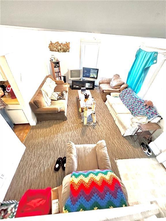 living room with hardwood / wood-style floors