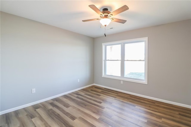 unfurnished room featuring ceiling fan and wood-type flooring