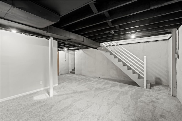 basement with carpet flooring