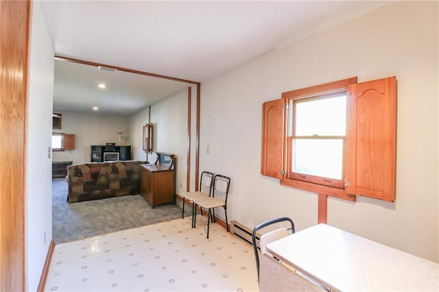 kitchen featuring light carpet