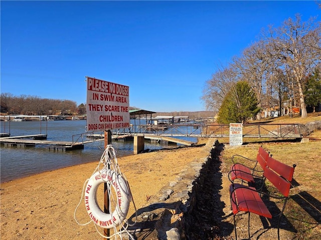 view of dock with a water view