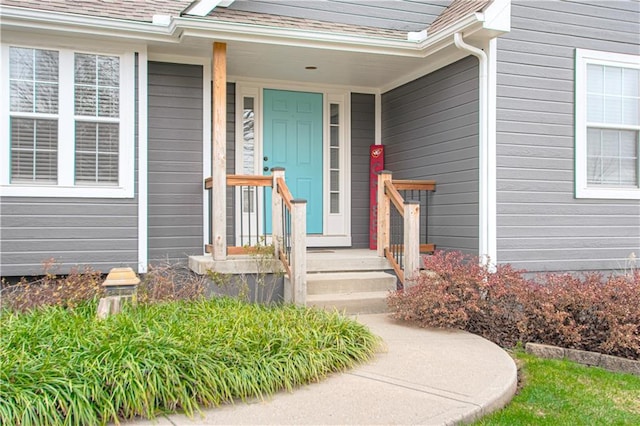 entrance to property with covered porch