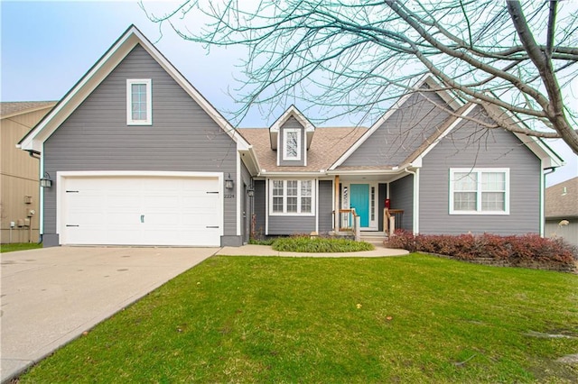 view of front of home featuring an attached garage, concrete driveway, and a front lawn