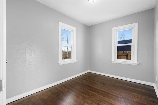 unfurnished room featuring wood-type flooring