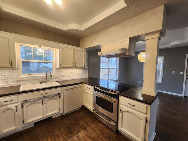 kitchen featuring dishwasher, dark wood-type flooring, kitchen peninsula, electric range, and white cabinetry