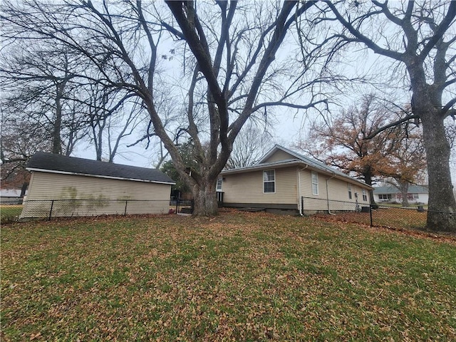 view of property exterior featuring a yard