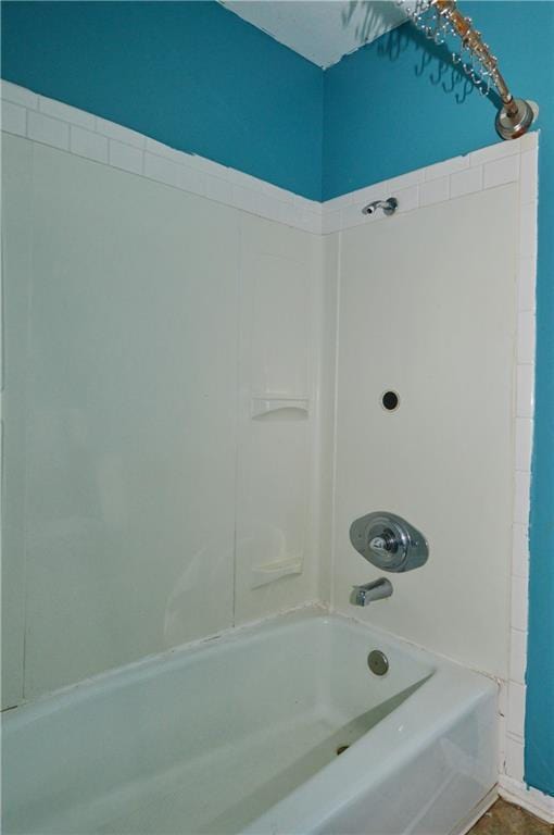 bathroom featuring shower / washtub combination