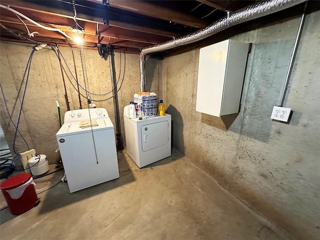 basement featuring separate washer and dryer