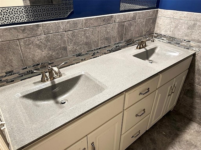 bathroom with backsplash and vanity