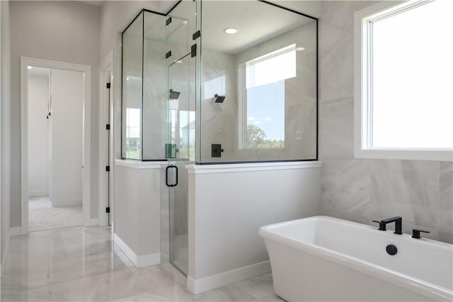 21513 W 80th Ter, Shawnee, KS 66220 - full bathroom with a freestanding bath, a shower stall, and marble finish floors