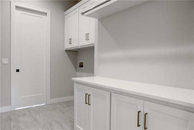 21513 W 80th Ter, Shawnee, KS 66220 - laundry room with baseboards