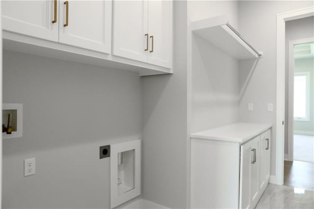 21513 W 80th Ter, Shawnee, KS 66220 - washroom with hookup for an electric dryer, cabinet space, and hookup for a washing machine