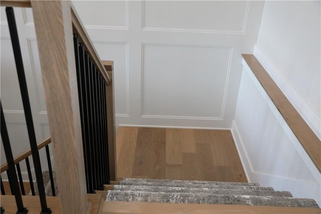 21513 W 80th Ter, Shawnee, KS 66220 - stairs with wood finished floors and a decorative wall
