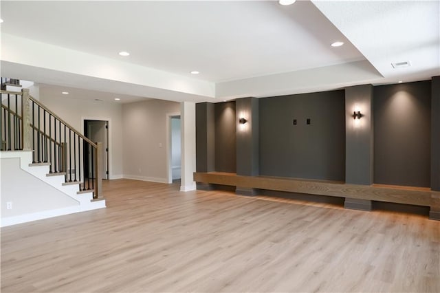 21513 W 80th Ter, Shawnee, KS 66220 - spare room featuring light wood-style flooring, stairway, and recessed lighting
