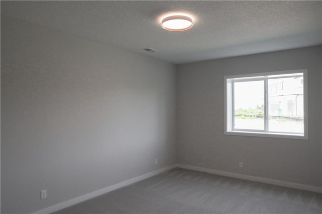 21513 W 80th Ter, Shawnee, KS 66220 - empty room featuring light carpet and a textured ceiling