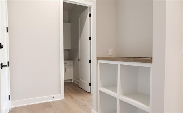 21513 W 80th Ter, Shawnee, KS 66220 - hallway featuring light wood-type flooring and baseboards