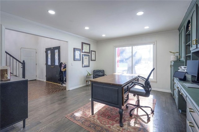 office with ornamental molding and dark hardwood / wood-style flooring