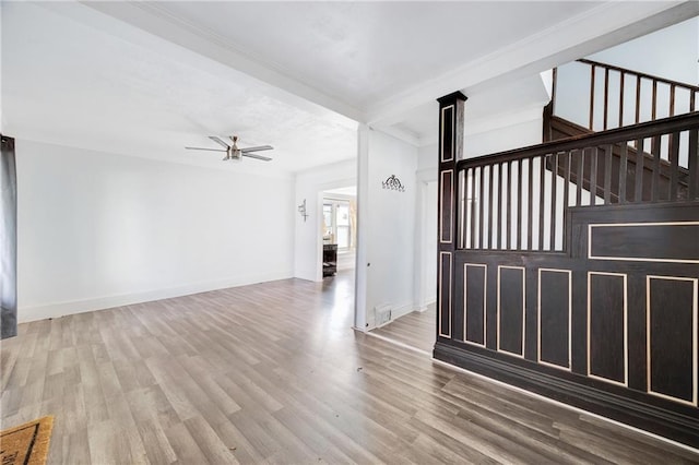 unfurnished living room with hardwood / wood-style floors and ceiling fan